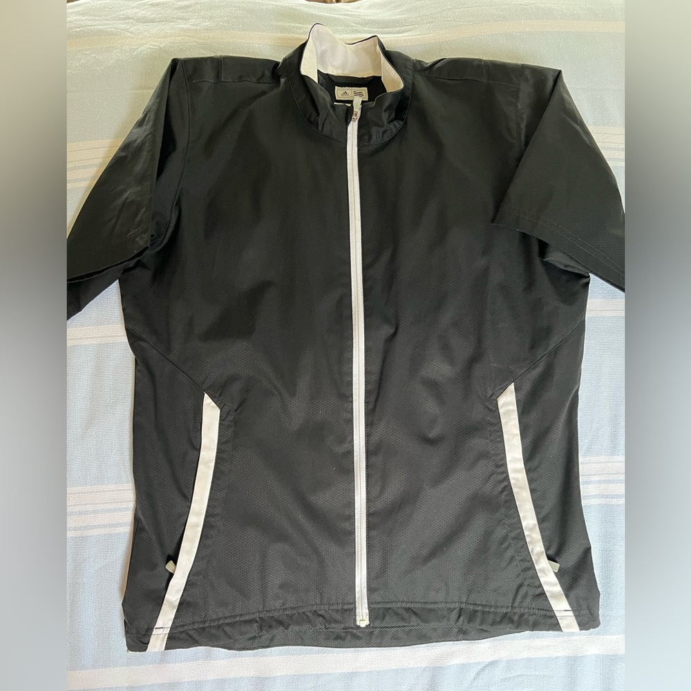 Adidas Black and White Short Sleeve Athletic Jacket

Zip Up